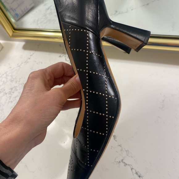 Gorgeous CHANEL heels black with bone colored quilting and CC monogram at toes. - Picture 8 of 13